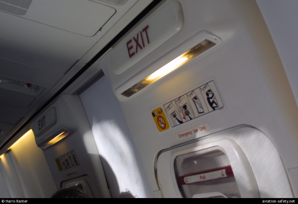 Photo of Boeing 7378K2 emergency exit Aviation Safety Network